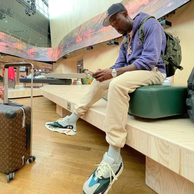 Freddie Gibbs outfit in Carhartt, Yeezy, and Louis Vuitton, 2022