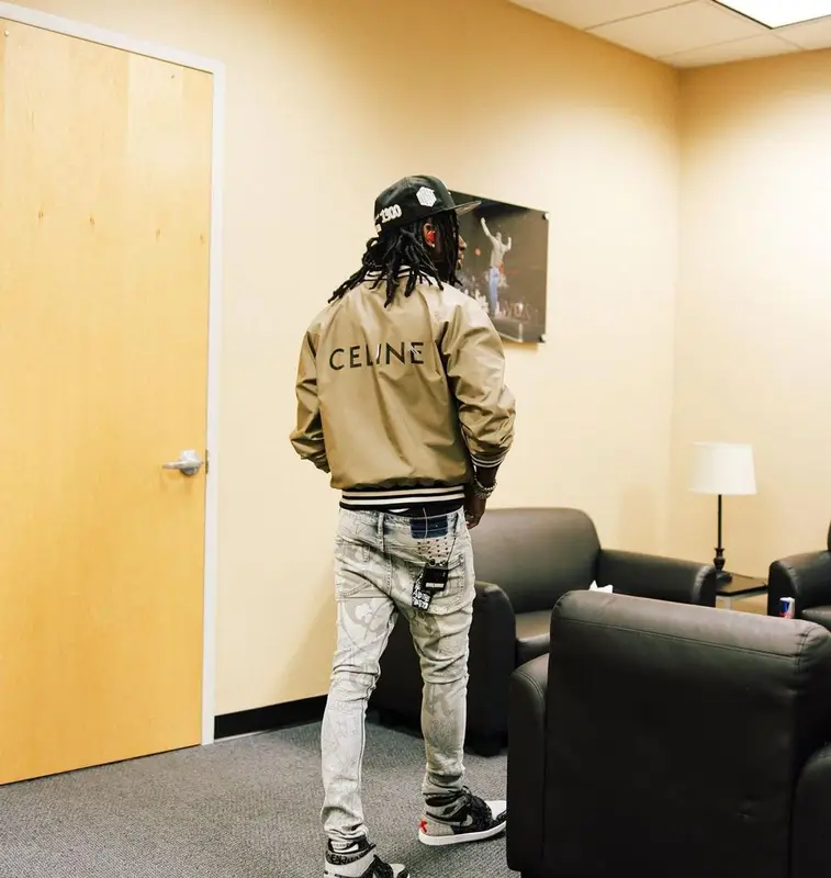 Polo G outfit in Celine, Ksubi, and Nike, 2022