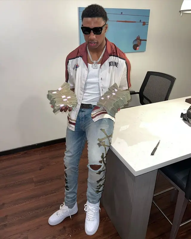 Rob49 outfit in Rhude, Nike, and Amiri, 2022