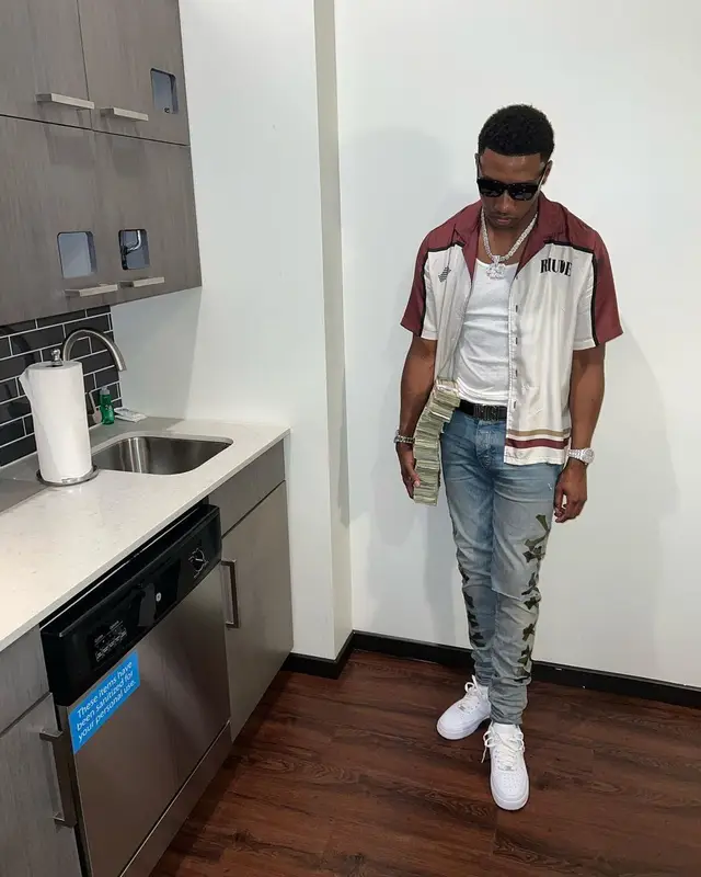Rob49 outfit in Rhude, Nike, and Amiri, 2022