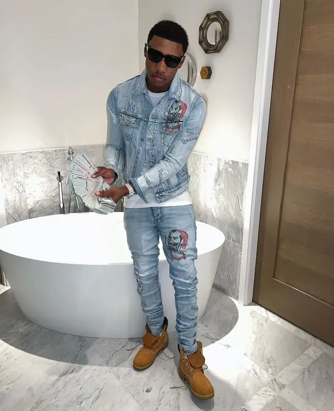 Rob49 outfit in Amiri, Timberland, and Zig-Zag World, 2022