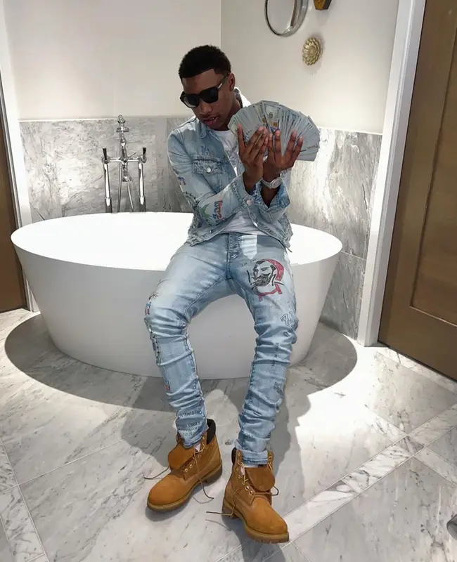 Rob49 outfit in Amiri, Timberland, and Zig-Zag World, 2022