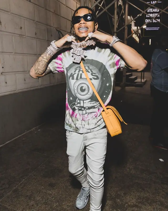 Lil Migo outfit in Gallery Dept., Louis Vuitton, and Goyard, 2022