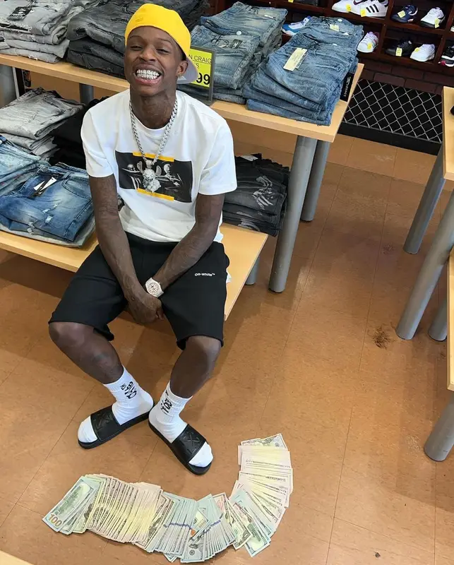 Quando Rondo outfit in Off-White, Fear of God, and New Era, 2022