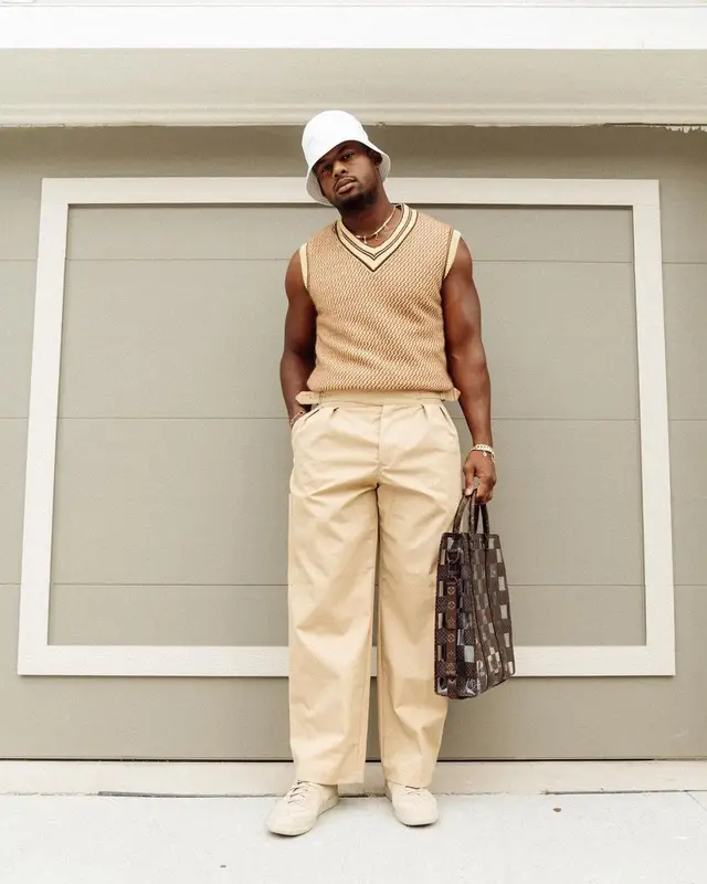 JuJu outfit in Wales Bonner, Louis Vuitton, and Prada, 2022