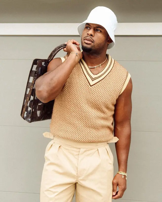JuJu outfit in Wales Bonner, Louis Vuitton, and Prada, 2022