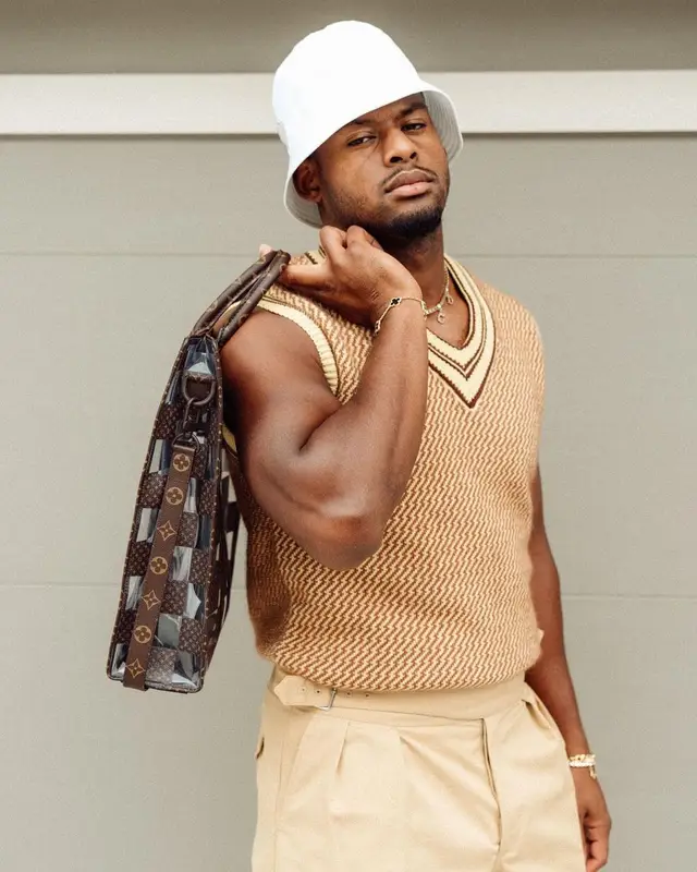 JuJu outfit in Wales Bonner, Louis Vuitton, and Prada, 2022