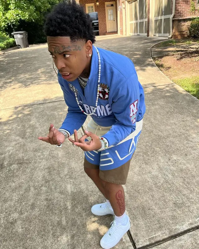 Lil Gotit outfit in Supreme, Nike, and Hanes, 2022