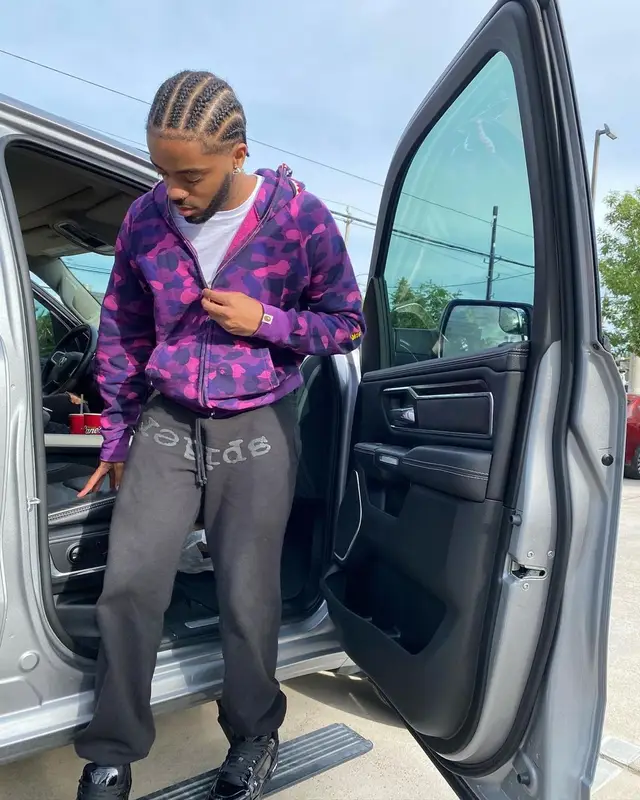 Lil Playah outfit in Bape, Spider Worldwide, and Louis Vuitton, 2022