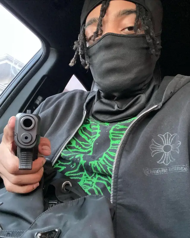 Lil Playah outfit in Chrome Hearts, Gucci, and Prada, 2021