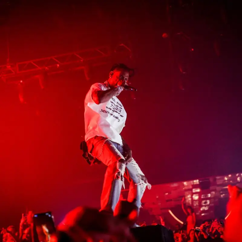 Travis Scott outfit in Travis Scott Merch, Louis Vuitton, and Takashi Murakami, 2022
