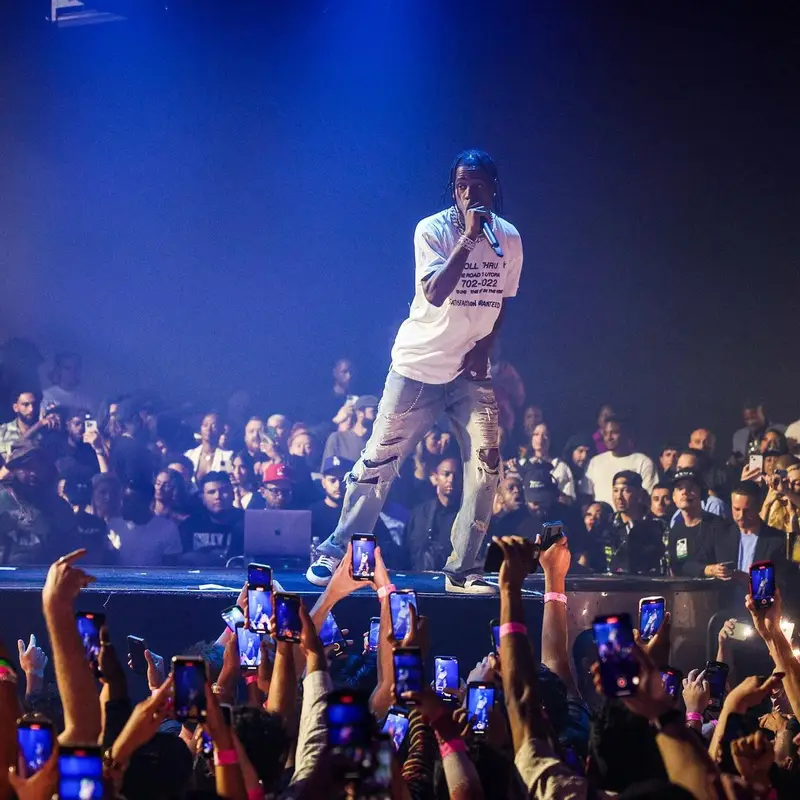 Travis Scott outfit in Travis Scott Merch, Louis Vuitton, and Takashi Murakami, 2022