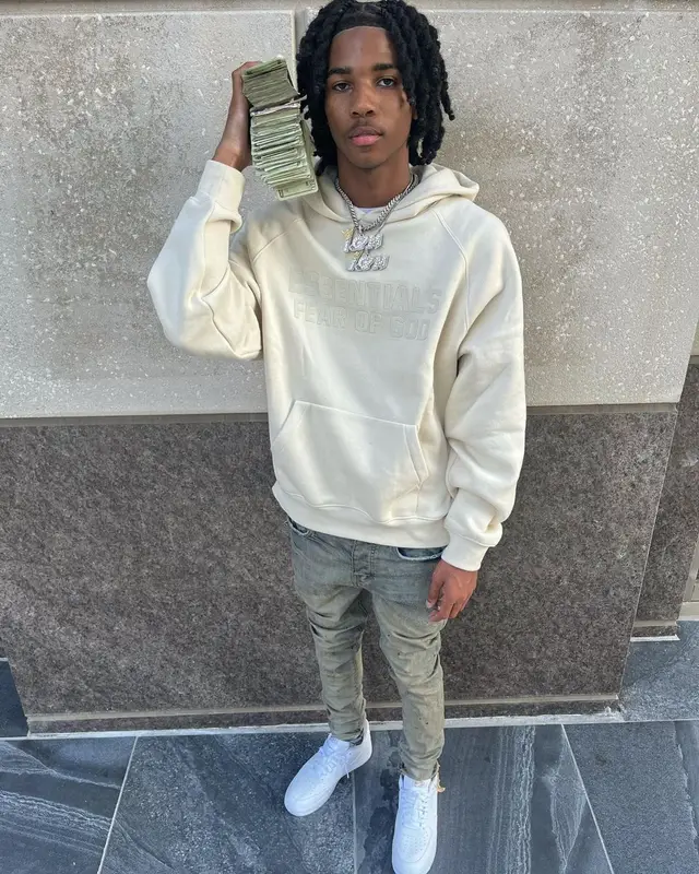 Lil Darius outfit in Fear of God, Purple Brand, and Nike, 2022