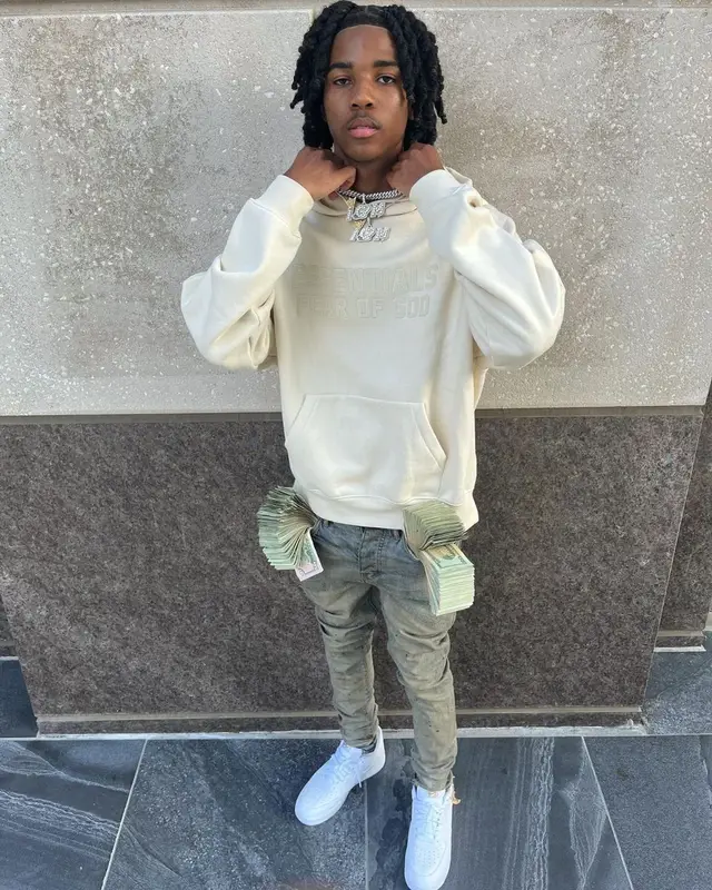 Lil Darius outfit in Fear of God, Purple Brand, and Nike, 2022