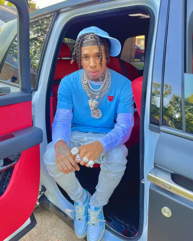 NLE Choppa outfit in Comme Des Garcons, Alexander McQueen, and Calvin Klein, 2022