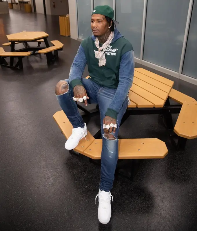 Moneybagg Yo outfit in Louis Vuitton, Amiri, and Nike, 2022