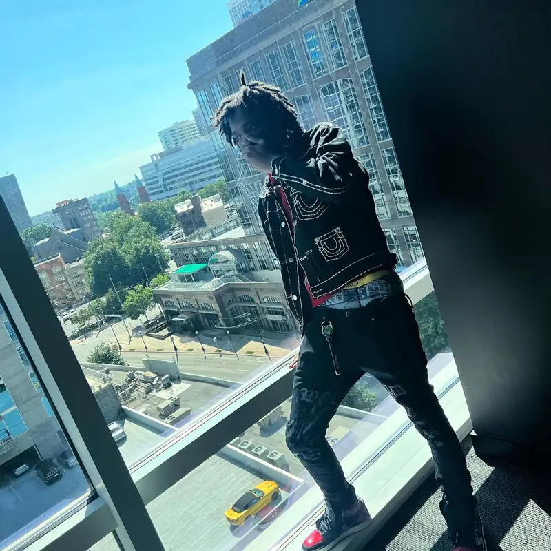 Duwap Kaine outfit in Supreme, True Religion, and Ethika, 2022