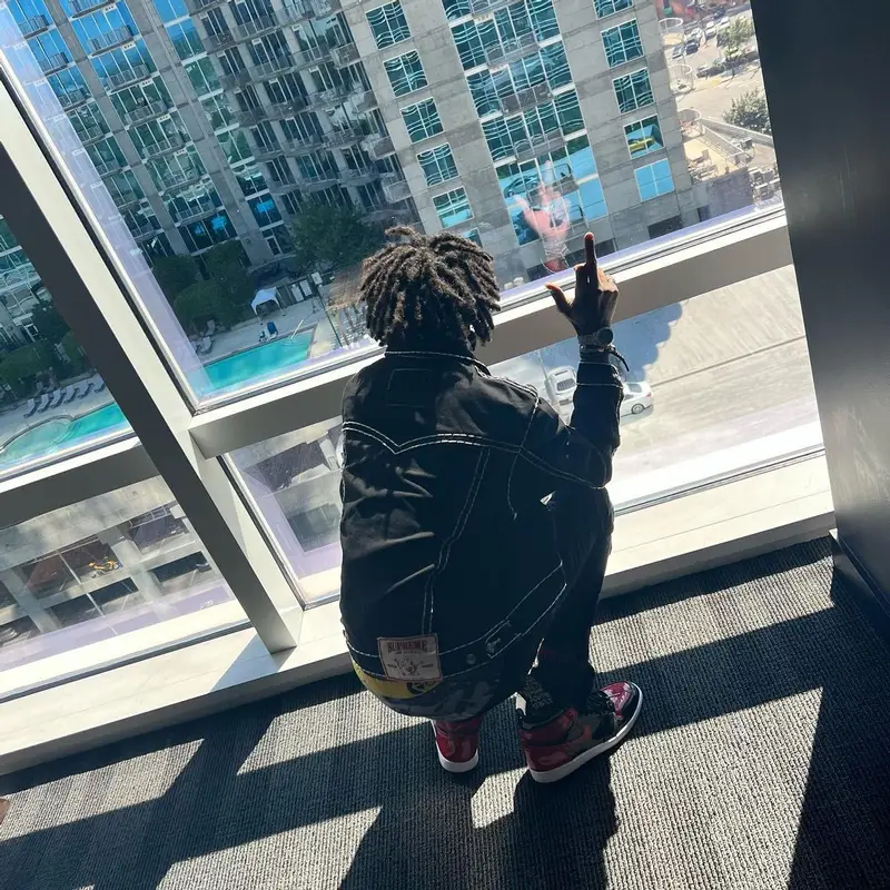 Duwap Kaine outfit in Supreme, True Religion, and Ethika, 2022