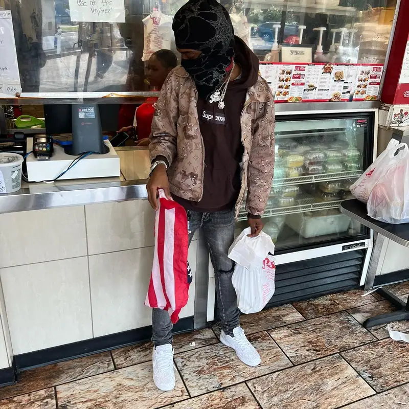 Duwap Kaine outfit in Supreme and Nike, 2022