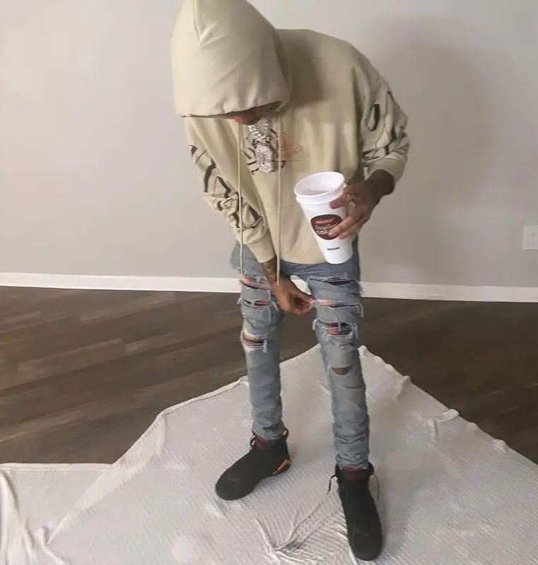 Lil Poppa outfit in Off-White, Amiri, and Jordan, 2022