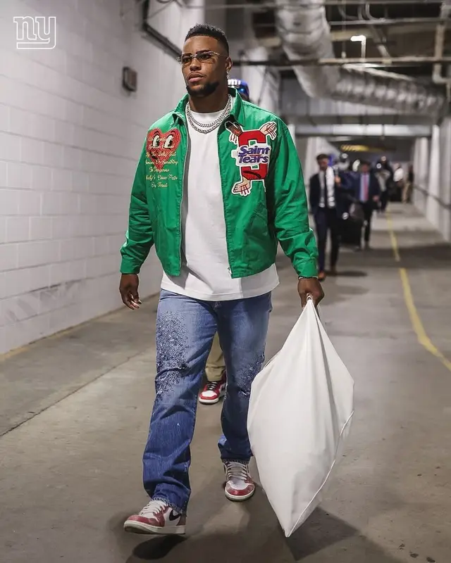 Saquon Barkley outfit in Denim Tears, Kapital, and Nike, 2022