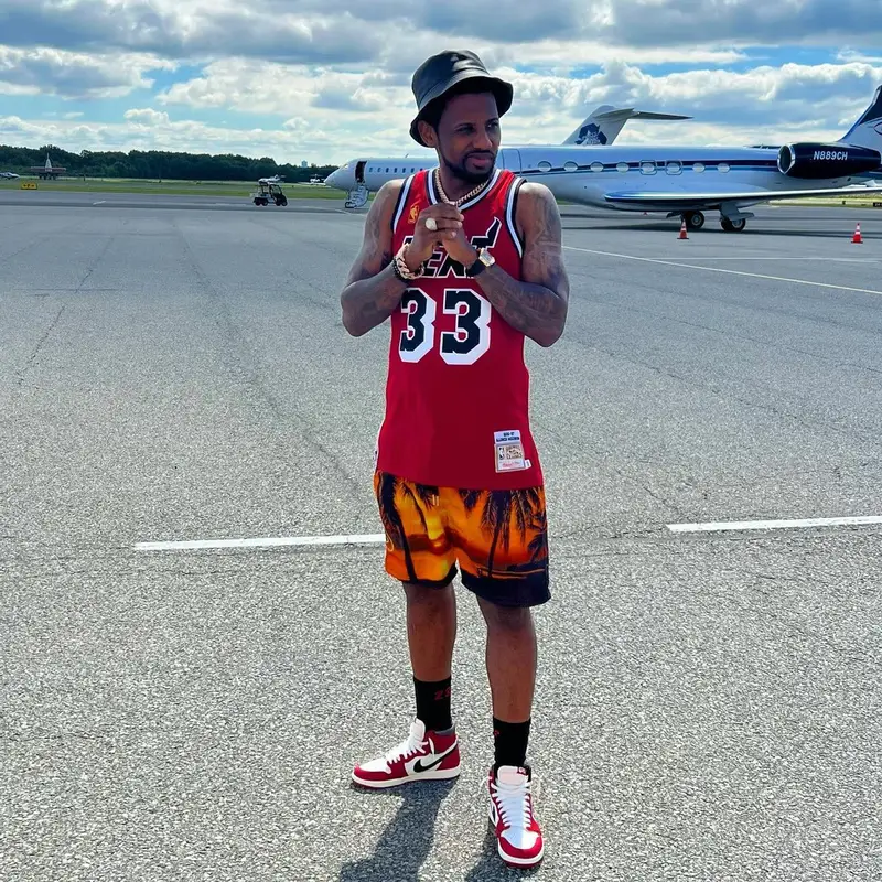 Fabolous outfit in Mitchell & Ness, Loewe, and Jordan, 2022
