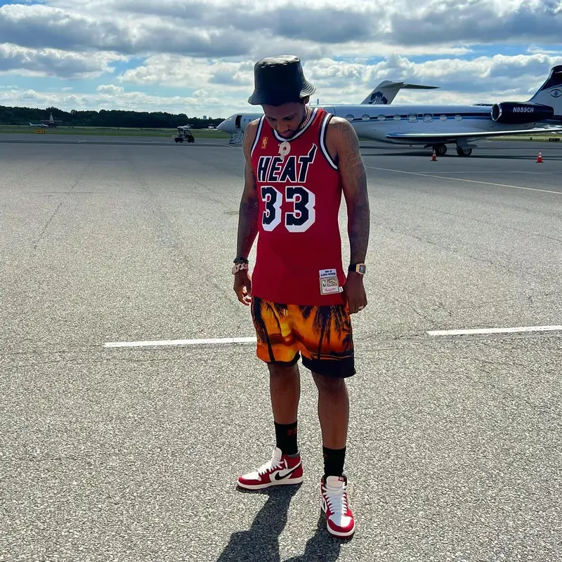 Fabolous outfit in Mitchell & Ness, Loewe, and Jordan, 2022