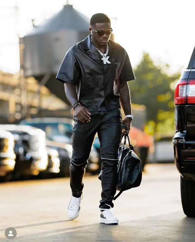 A.J. Brown outfit in Prada, Amiri, and Louis Vuitton, 2022
