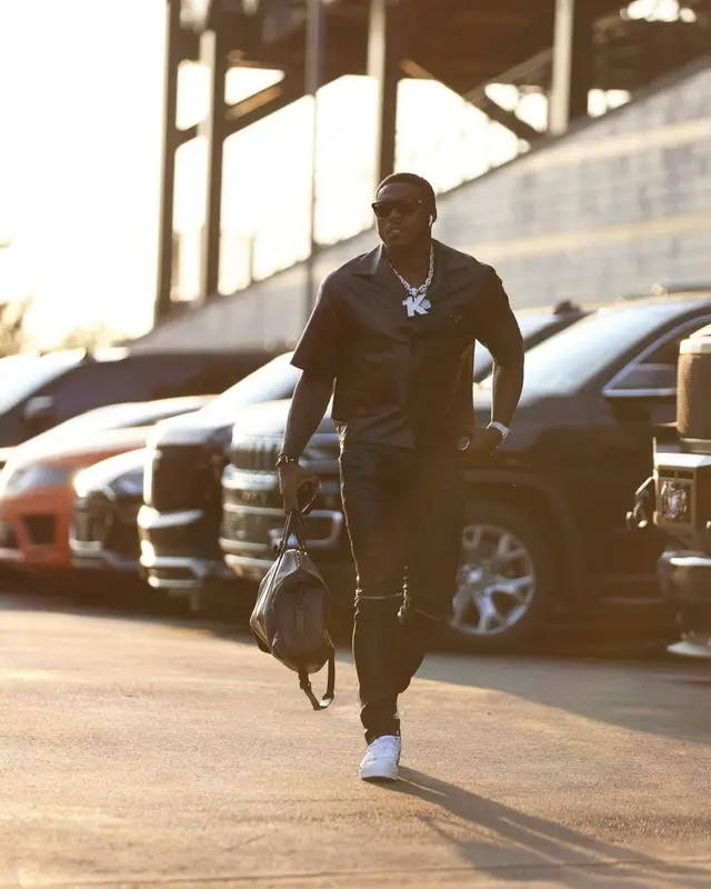 A.J. Brown outfit in Prada, Amiri, and Louis Vuitton, 2022