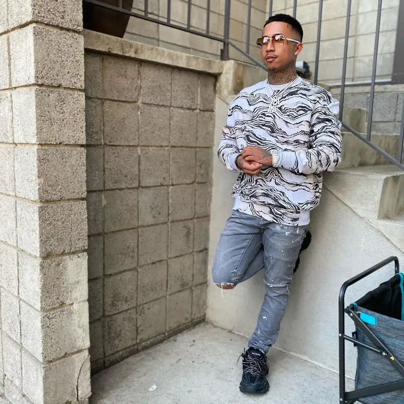 MBNel outfit in Twenty Montreal, Purple Brand, and Cartier, 2022