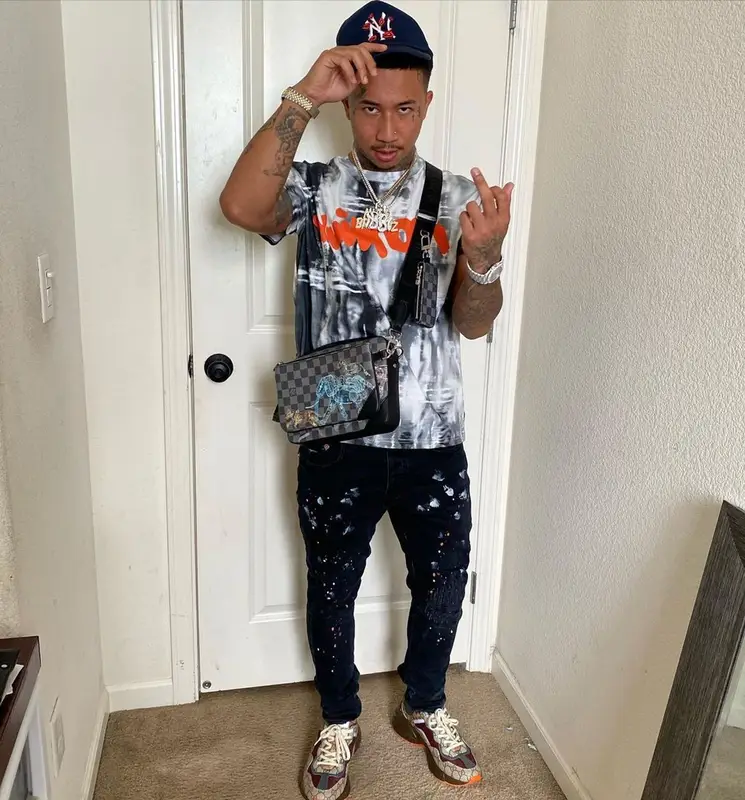 MBNel outfit in Purple Brand, Gucci, and Louis Vuitton, 2022