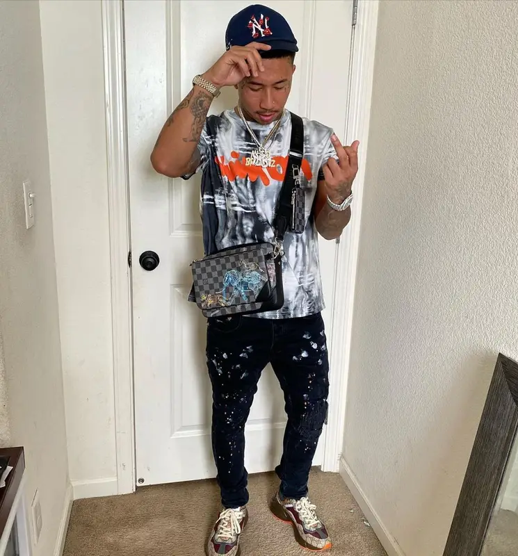 MBNel outfit in Purple Brand, Gucci, and Louis Vuitton, 2022