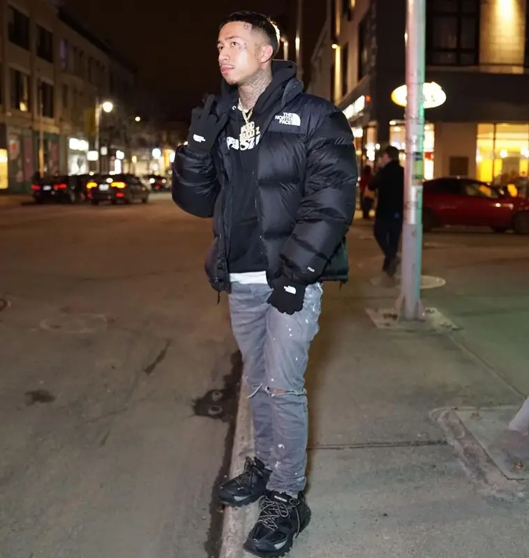 MBNel outfit in The North Face, Purple Brand, and Balenciaga, 2022