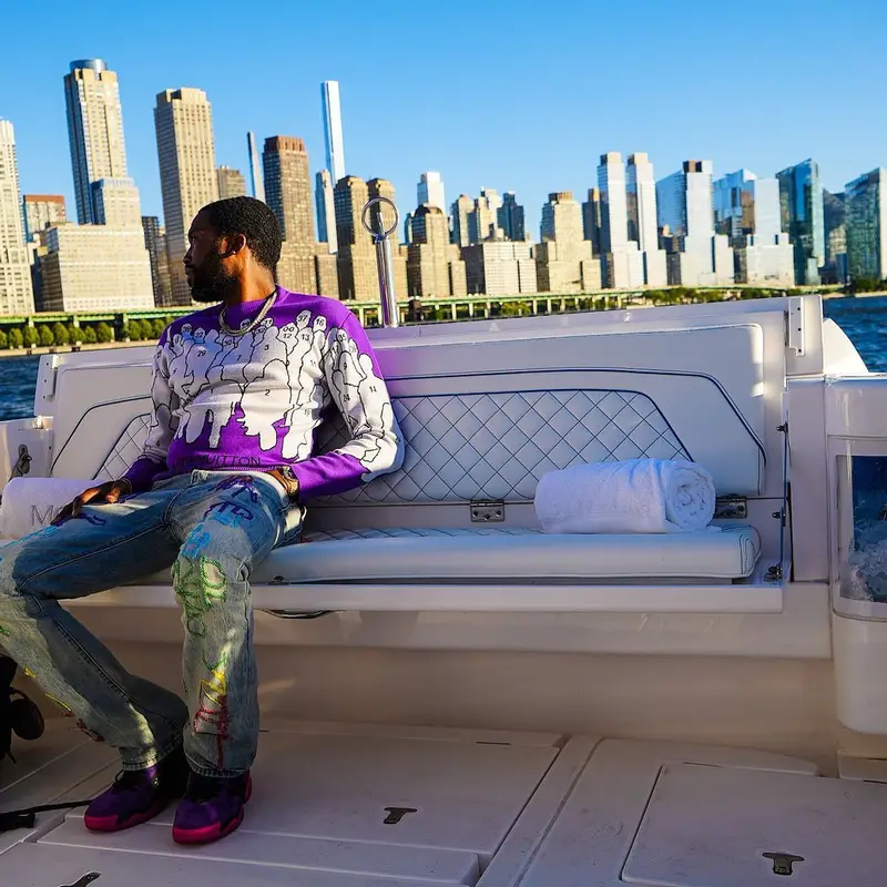 Meek Mill outfit in Louis Vuitton and Who Decides War, 2022