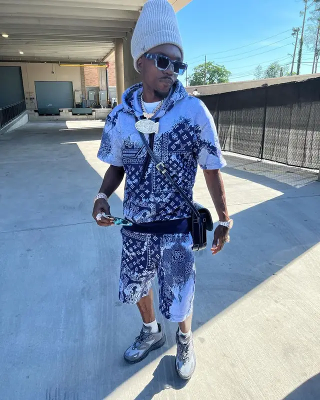 Bobby Fishscale outfit in Goyard and Louis Vuitton, 2022