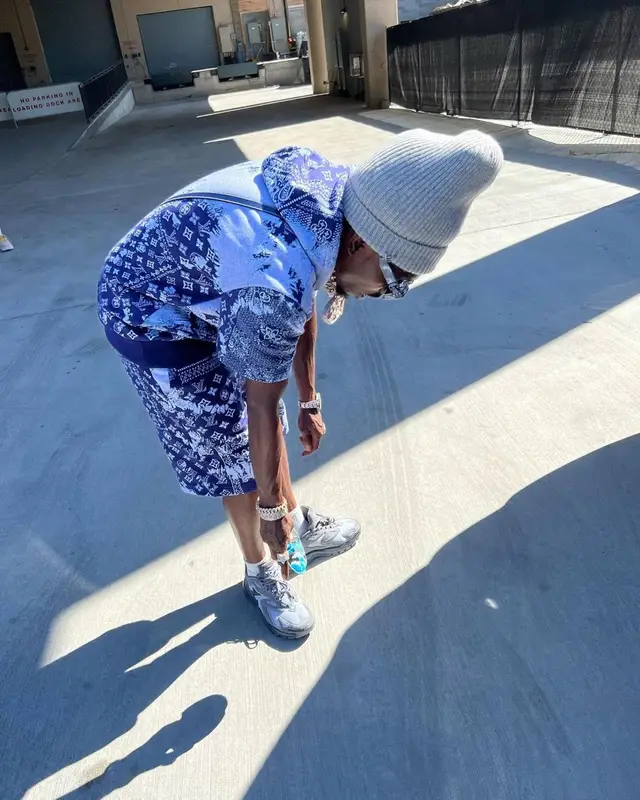 Bobby Fishscale outfit in Goyard and Louis Vuitton, 2022