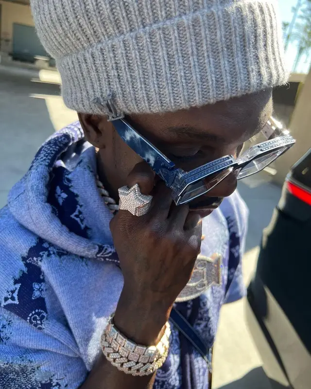 Bobby Fishscale outfit in Goyard and Louis Vuitton, 2022