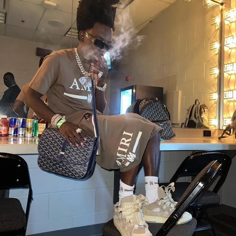 Bobby Fishscale outfit in Amiri, Lanvin, and Goyard, 2022