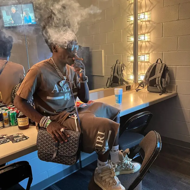 Bobby Fishscale outfit in Amiri, Lanvin, and Goyard, 2022