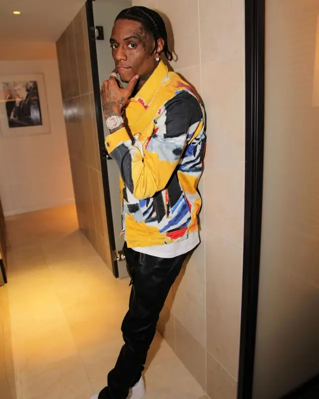Soulja Boy outfit in Purple Brand and Nike, 2022