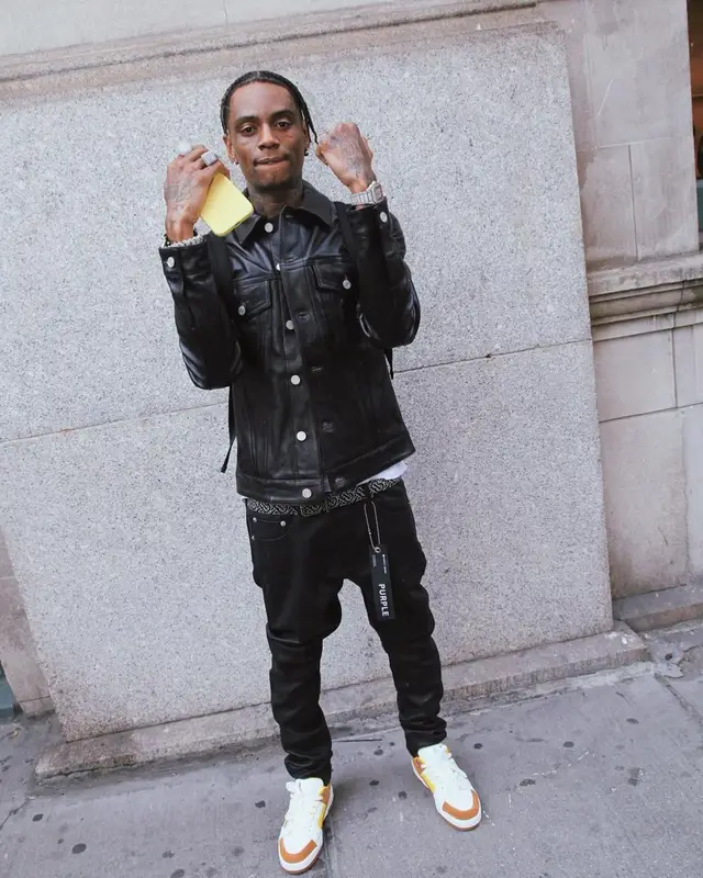 Soulja Boy outfit in Purple Brand, Burberry, and Nike, 2022