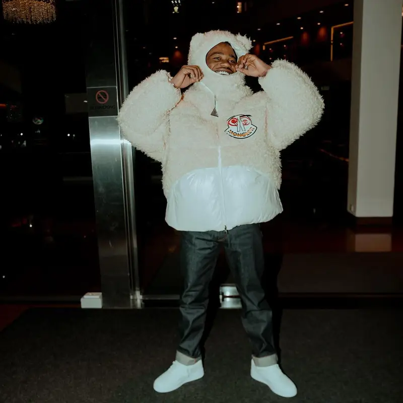 Roddy Ricch outfit in Dior, Louis Vuitton, and Moncler, 2022