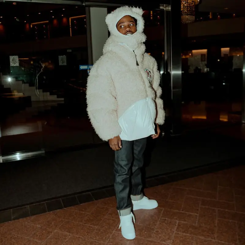Roddy Ricch outfit in Dior, Louis Vuitton, and Moncler, 2022
