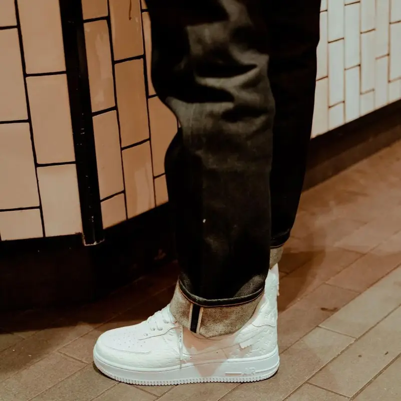 Roddy Ricch outfit in Dior, Louis Vuitton, and Moncler, 2022