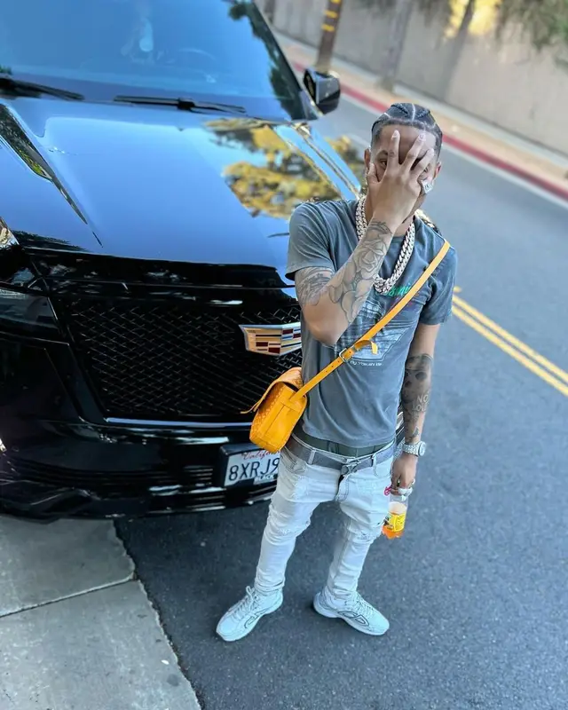 Lil Migo outfit in Gallery Dept., Louis Vuitton, and Goyard, 2022