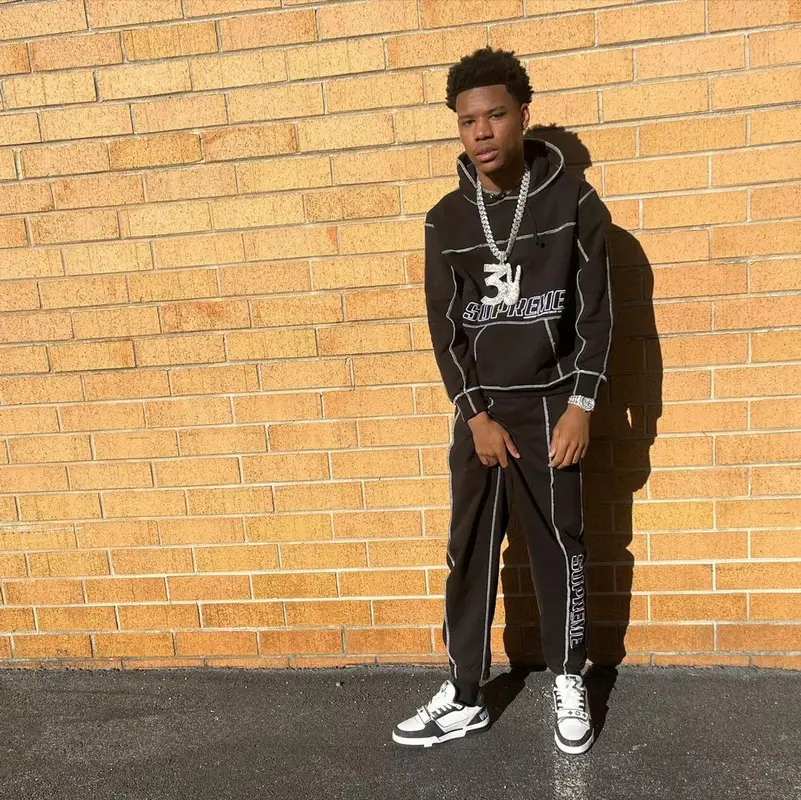 Nardo Wick outfit in Supreme and Louis Vuitton, 2022