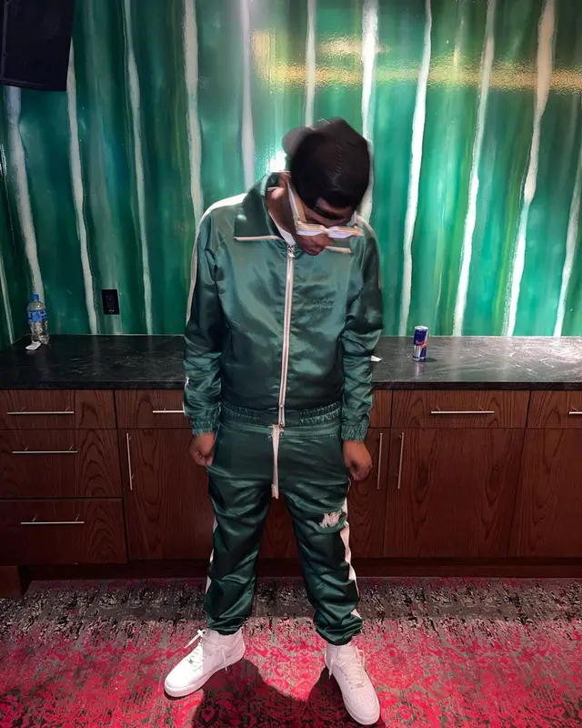 Sha EK outfit in Amiri, Nike, and Louis Vuitton, 2022