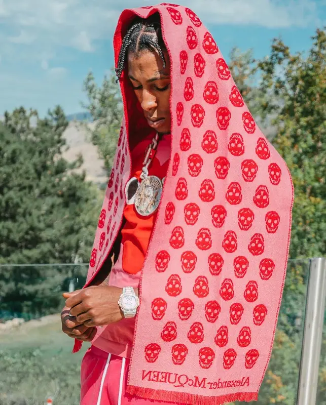 NBA YoungBoy outfit in Comme Des Garcons, Purple Brand, and Alexander McQueen, 2022