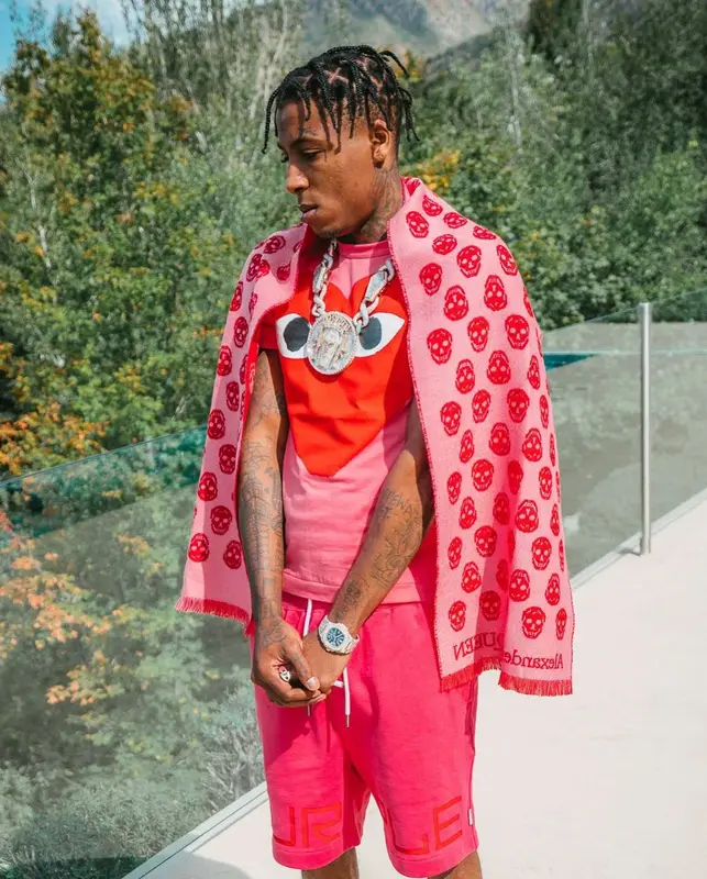 NBA YoungBoy outfit in Comme Des Garcons, Purple Brand, and Alexander McQueen, 2022