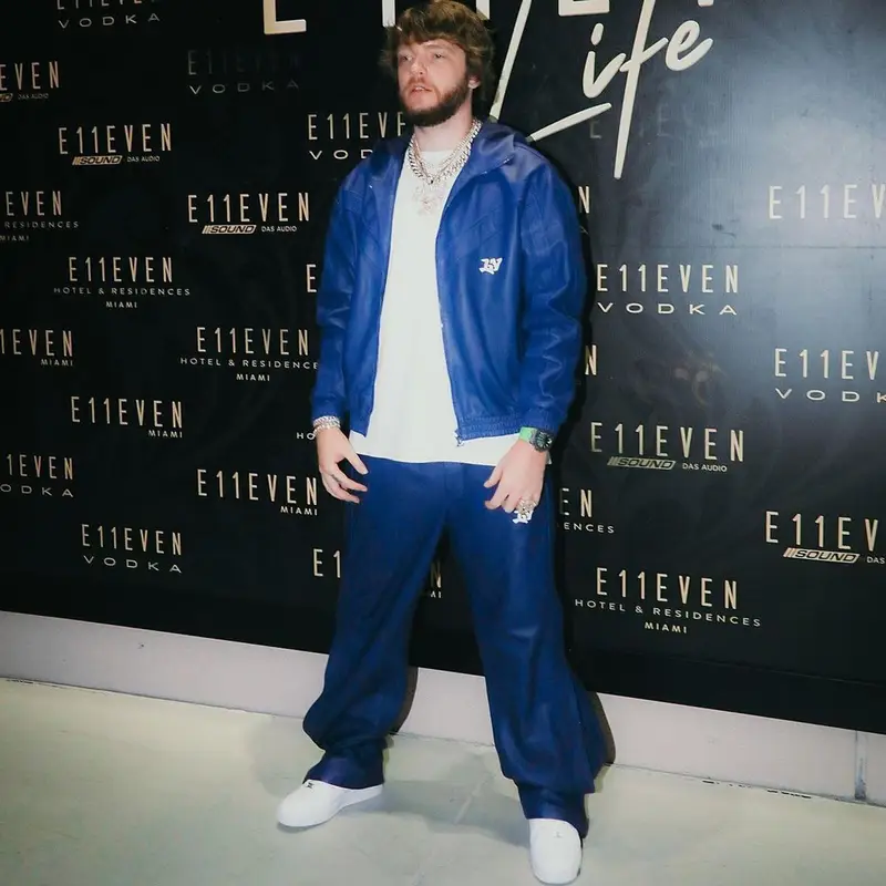 Murda Beatz outfit in Gallery Dept., Louis Vuitton, and Nike, 2022